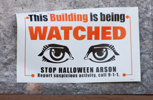 Posters on abandoned buildings throughout Detroit's neighborhoods.