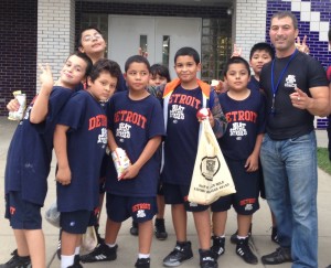 Coach Mike Conflitti on right with Beat the Street Detroit participants