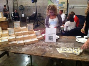 Here you see Talent Manager Sarah Frasier in front of theTeam Detroit Info table
